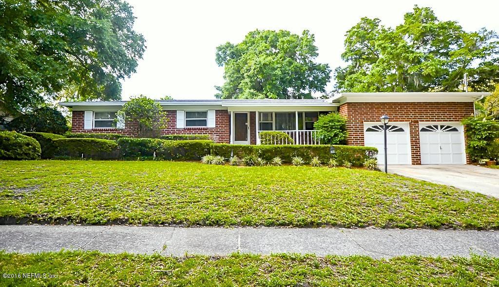 6638 West Fincannon Road Jacksonville, FL 32277 - Photo 1 of 27 a front view of a house with garden