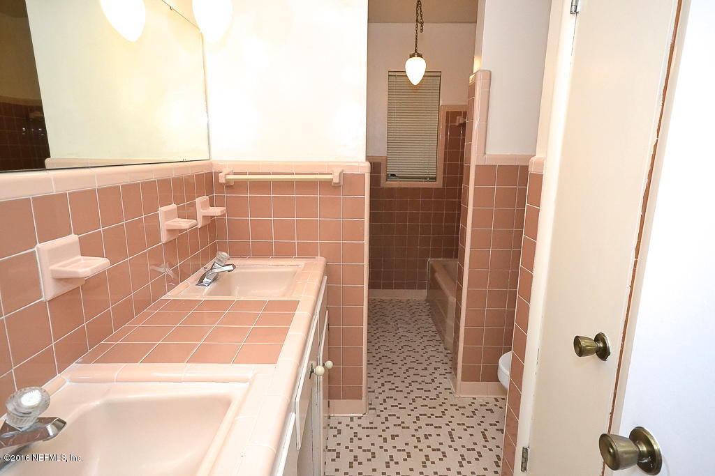 6638 West Fincannon Road Jacksonville, FL 32277 - Photo 12 of 27 a bathroom with a shower