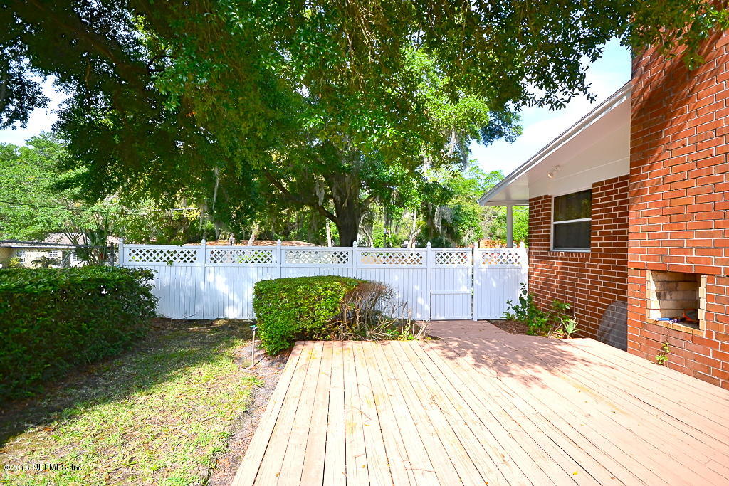 6638 West Fincannon Road Jacksonville, FL 32277 - Photo 22 of 27 a view of a backyard
