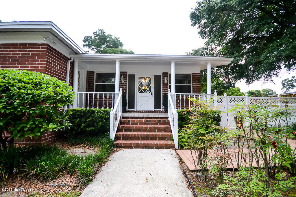 6638 West Fincannon Road Jacksonville, FL 32277 - Photo 24 of 27 a view of a house with potted plants