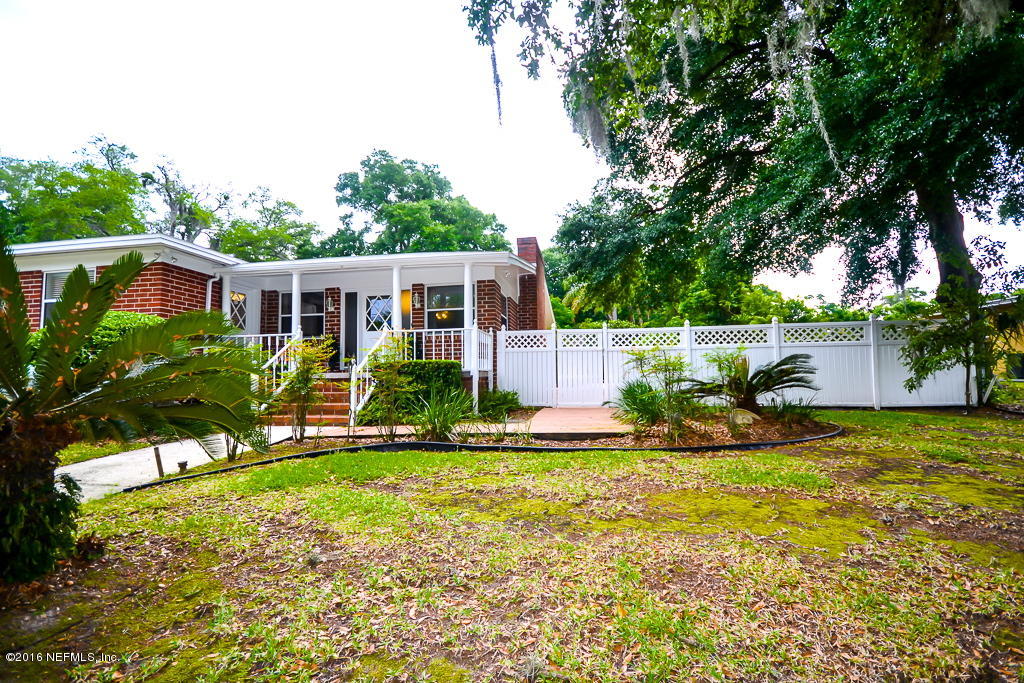 6638 West Fincannon Road Jacksonville, FL 32277 - Photo 25 of 27 a view of an house with backyard space and garden