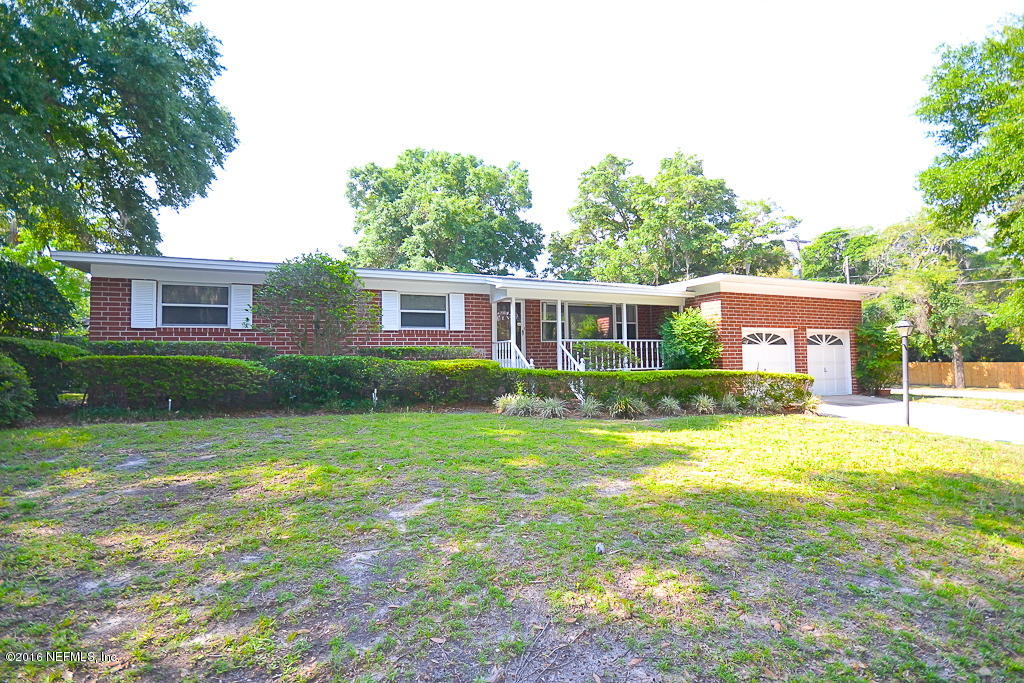6638 West Fincannon Road Jacksonville, FL 32277 - Photo 26 of 27 a view of a house with a yard