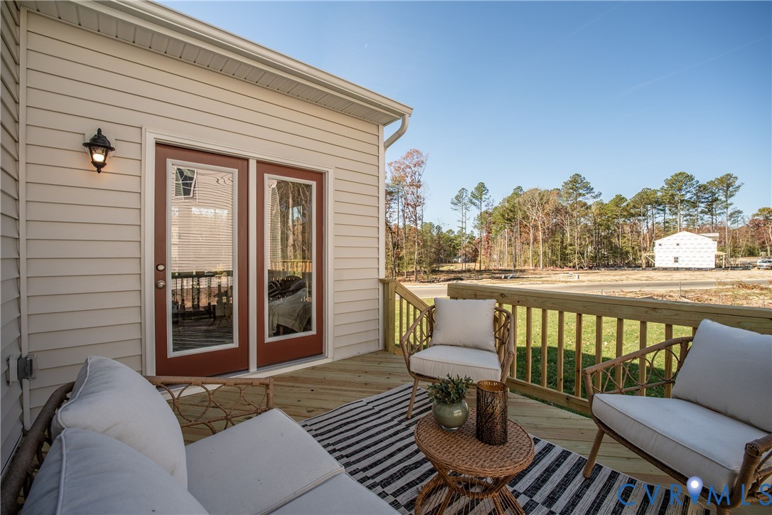 5318 Qualla Trace Chesterfield, VA 23832 - Photo 15 of 35 a view of a chairs and table on the deck