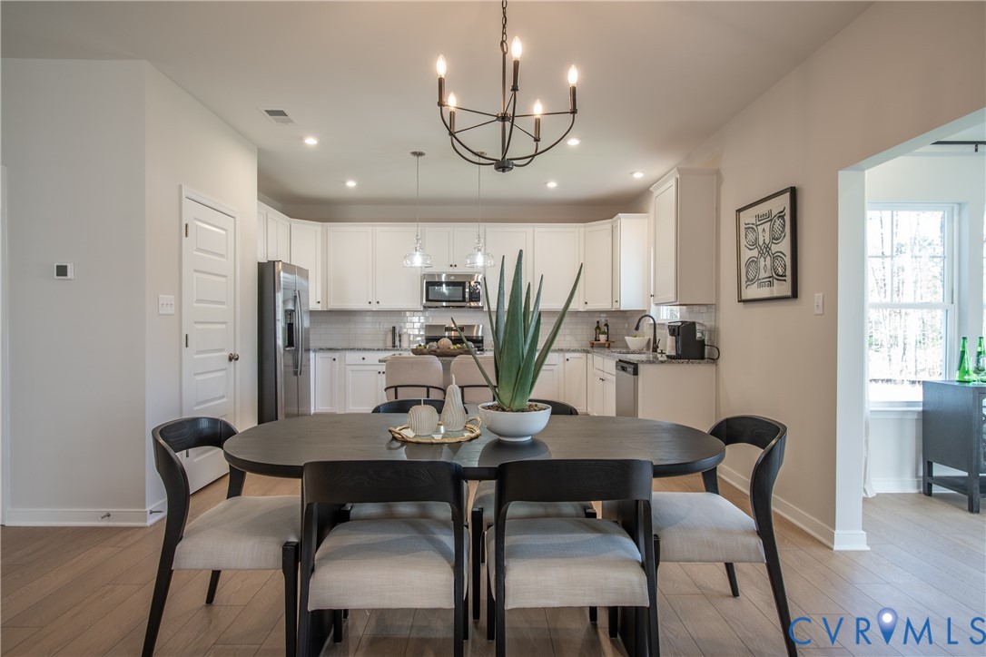 5318 Qualla Trace Chesterfield, VA 23832 - Photo 5 of 35 a view of a dining room with furniture and window