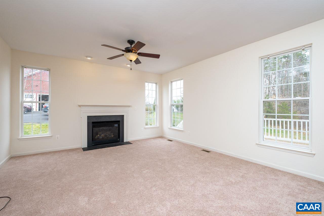 5378 Park Road Crozet, VA 22932 - Photo 13 of 40 a view of empty room with a fireplace and windows