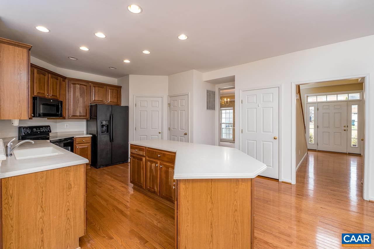 5378 Park Road Crozet, VA 22932 - Photo 6 of 40 a large kitchen with stainless steel appliances granite countertop a granite counter tops and a refrigerator