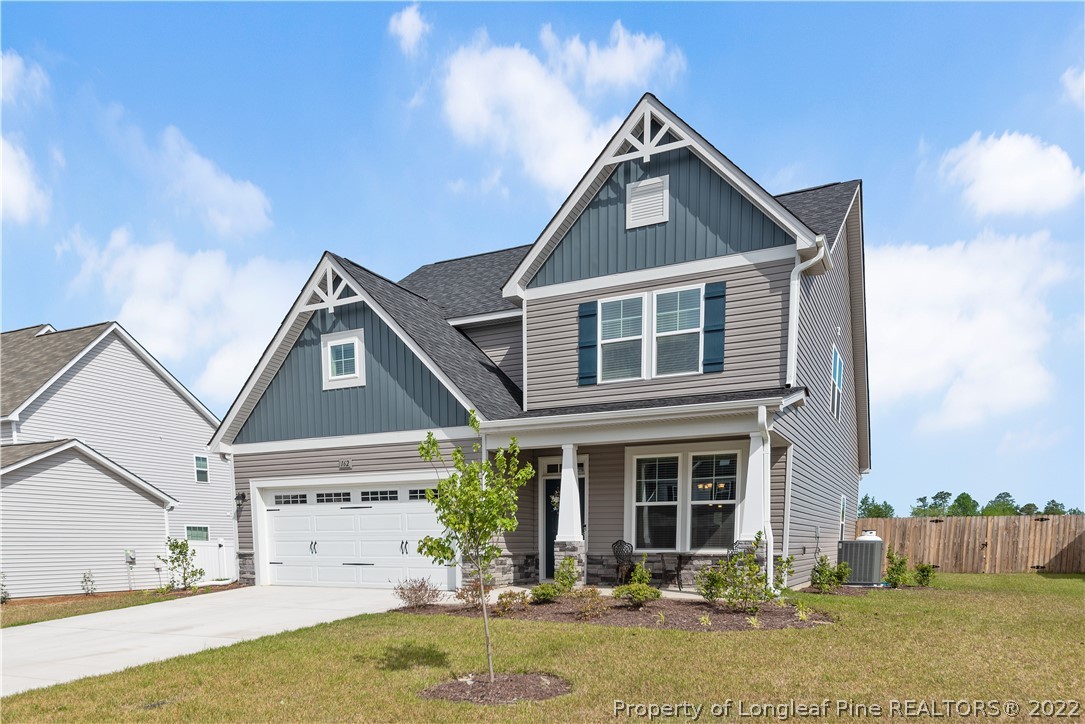 162 Trinity Road Raeford, NC 28376 - Photo 1 of 33 a front view of a house with garden