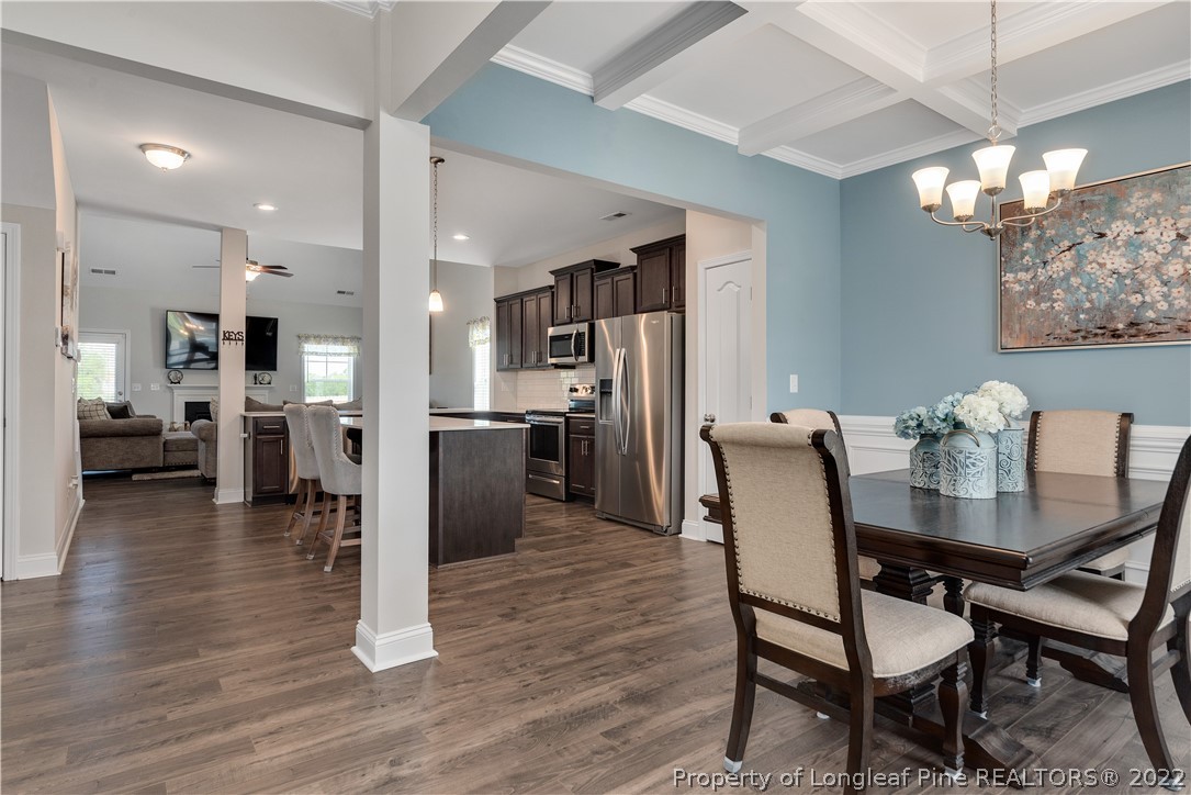 162 Trinity Road Raeford, NC 28376 - Photo 12 of 33 a view of a dining room with furniture and wooden floor