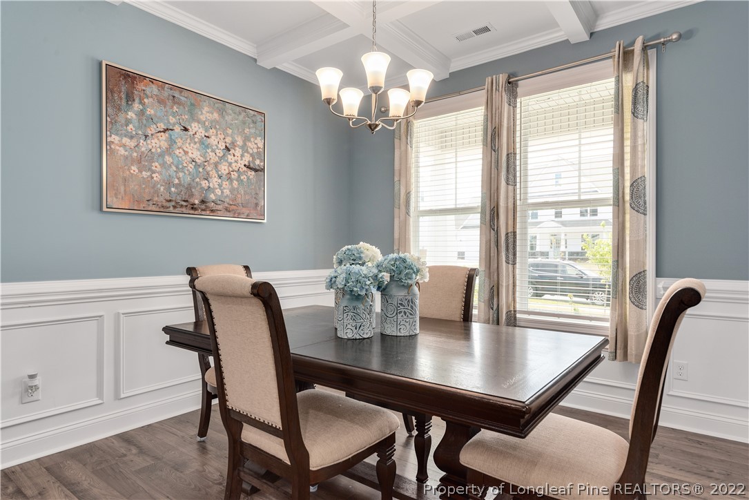 162 Trinity Road Raeford, NC 28376 - Photo 13 of 33 a view of a dining room with furniture window and wooden floor