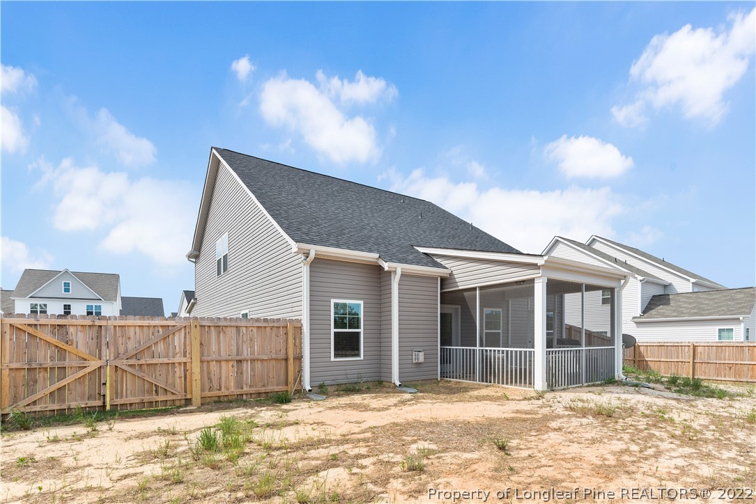 162 Trinity Road Raeford, NC 28376 - Photo 17 of 33 a view of a house with a yard