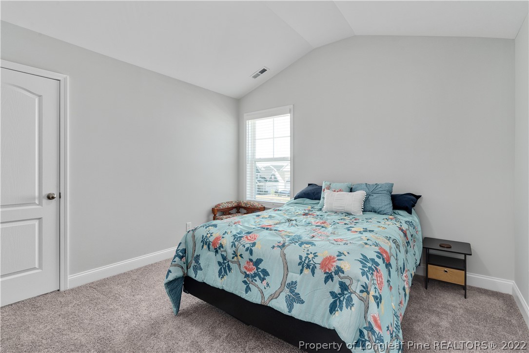 162 Trinity Road Raeford, NC 28376 - Photo 20 of 33 a bedroom with a bed and a window