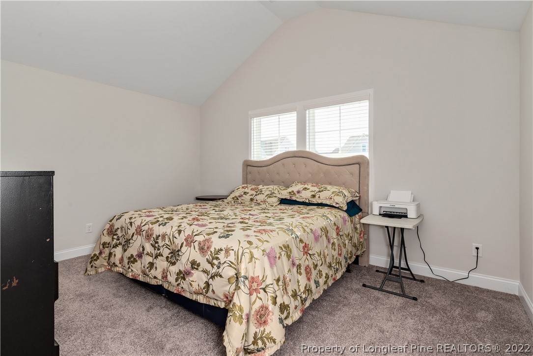 162 Trinity Road Raeford, NC 28376 - Photo 23 of 33 a bedroom with a bed and a window