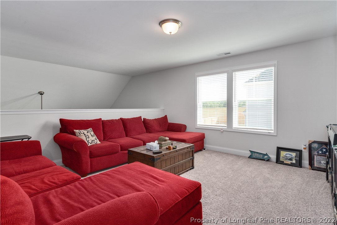 162 Trinity Road Raeford, NC 28376 - Photo 25 of 33 a living room with furniture and a window