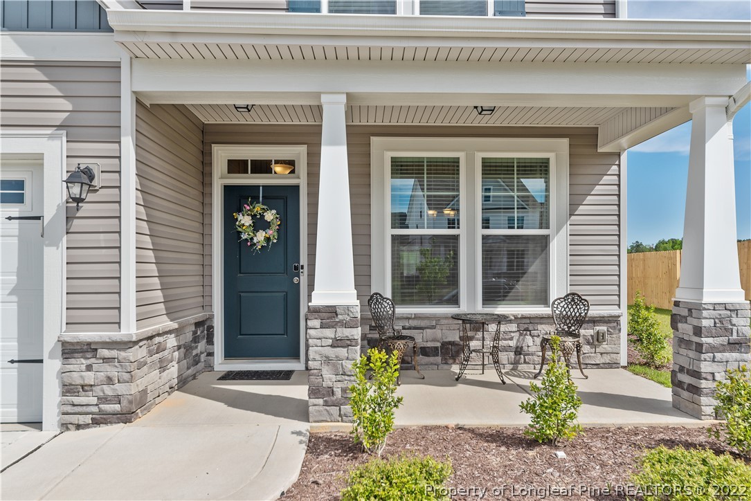 162 Trinity Road Raeford, NC 28376 - Photo 3 of 33 a front view of a house with outdoor seating