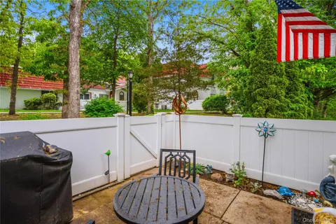 a view of a patio in backyard