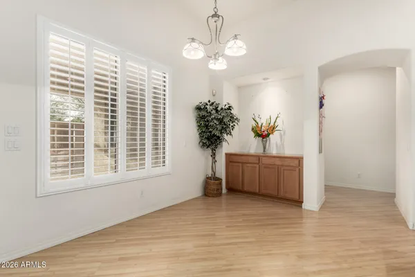 a view of a room with a window and cabinet