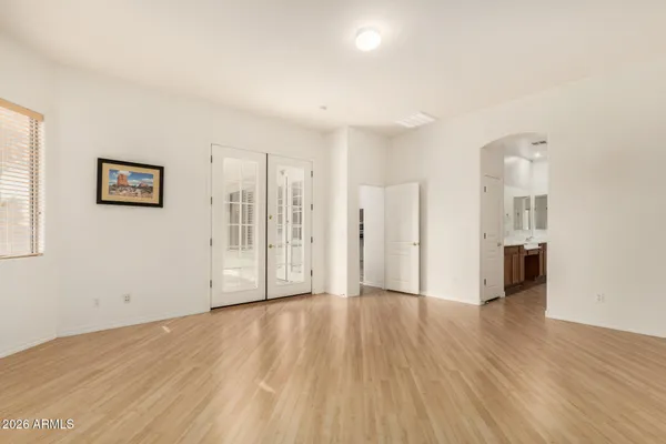 a view of a livingroom with wooden floor