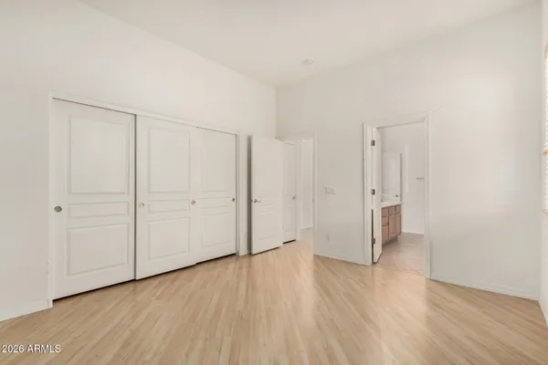 a view of a livingroom with wooden floor