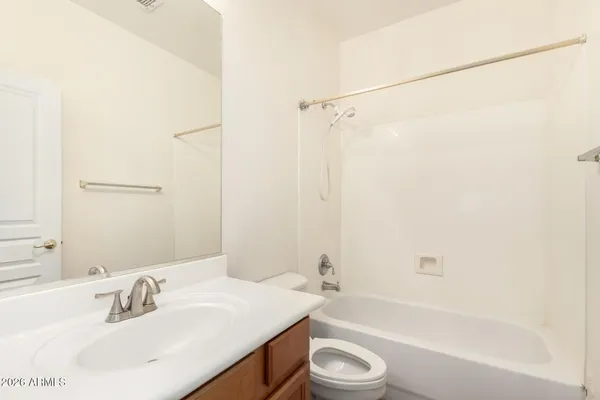a bathroom with a sink a toilet and a bathtub