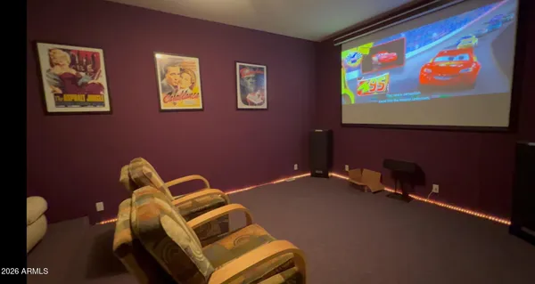 a room with furniture and screen