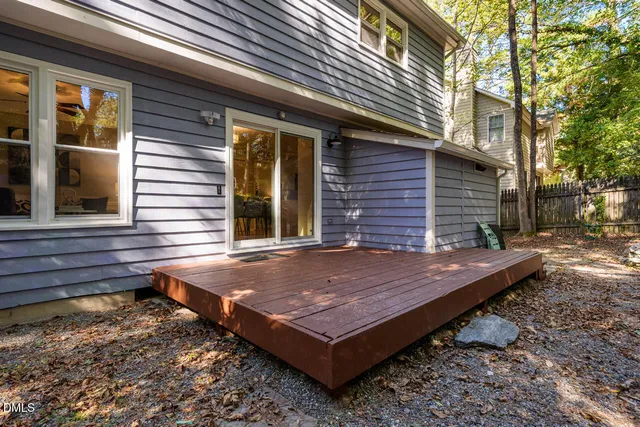 a view of a wooden floor with a wooden fence