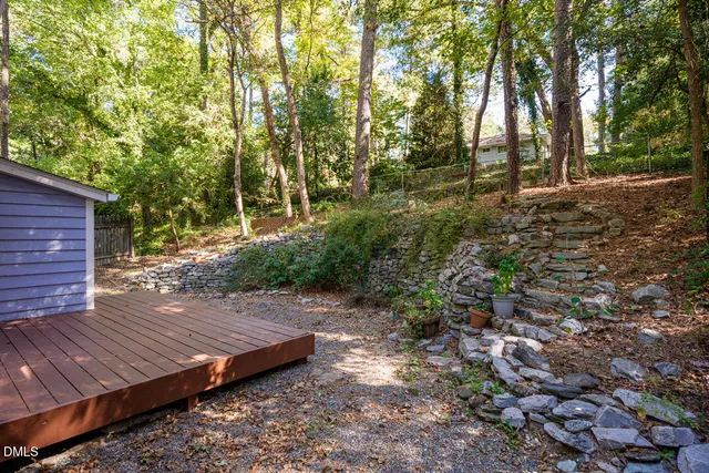 a backyard of a house with lots of green space