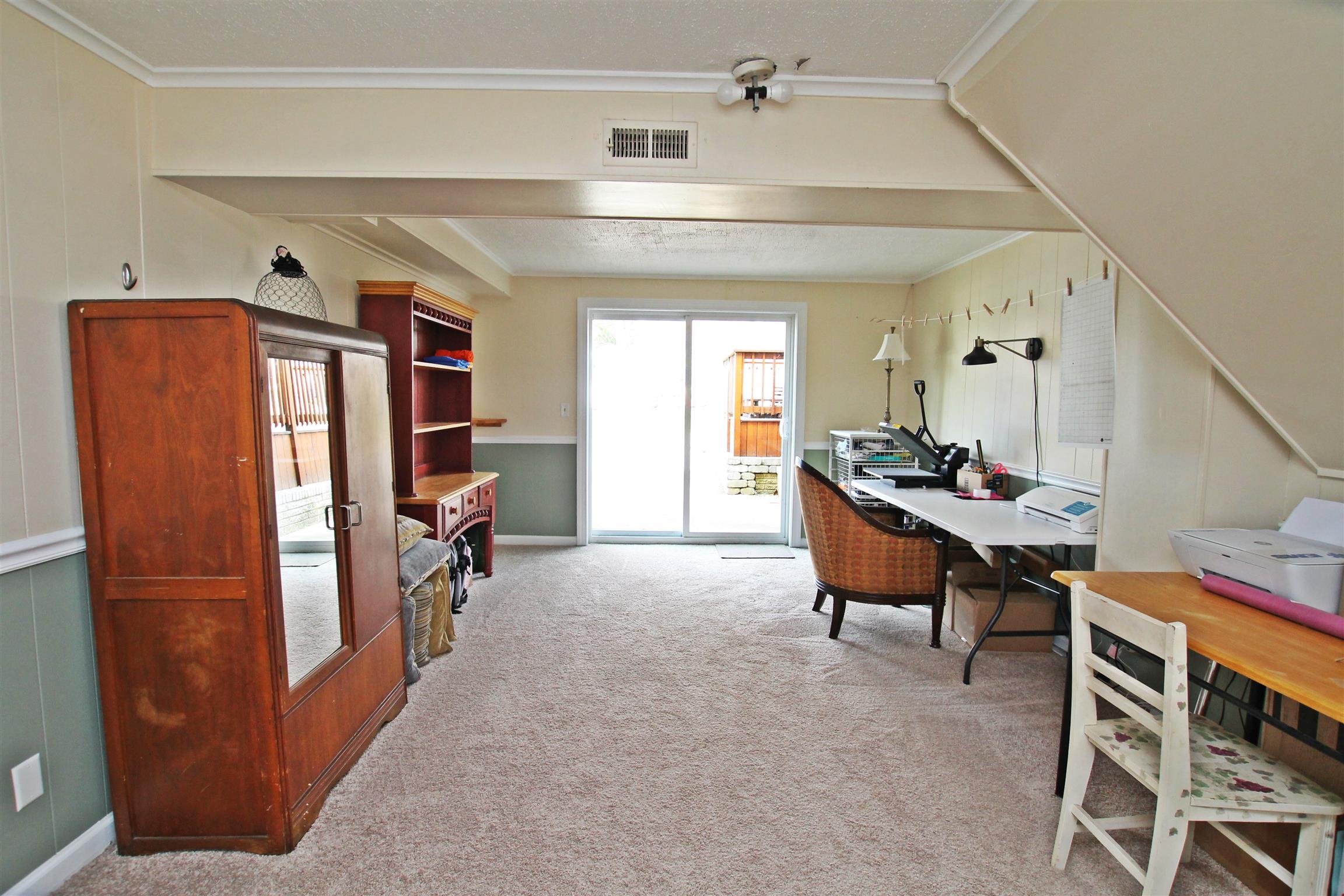 5141 New Chapel Road Springfield, TN 37172 - Photo 22 of 30 a living room with furniture a dining table and chairs