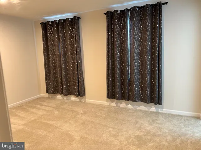 a view of a room that has a large door