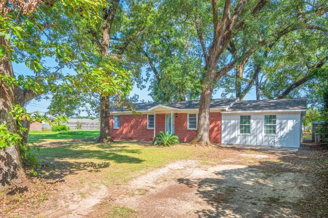 front view of a house with a patio