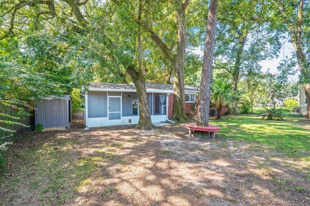 a backyard of a house with seating space