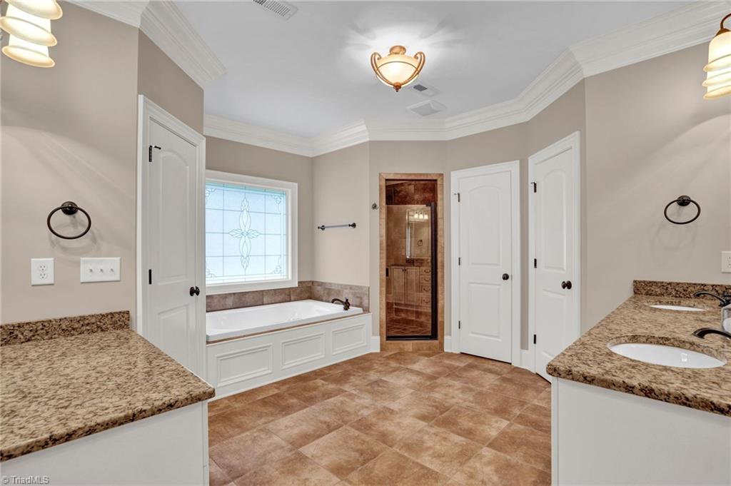 8410 Linville Oaks Drive Oak Ridge, NC 27310 - Photo 29 of 47 Primary Bathroom-2nd floor