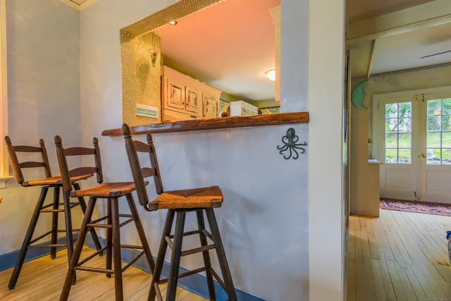 a view of staircase with lots of stuff and a window