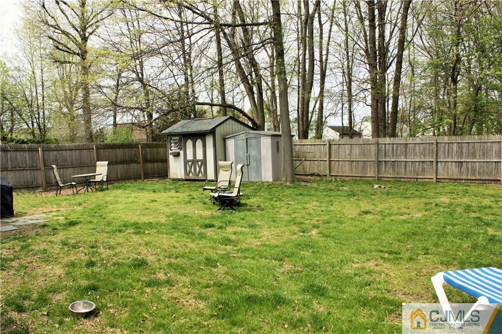 33 Ashley Road Edison, NJ 08817 - Photo 19 of 20 front view of a house with a yard