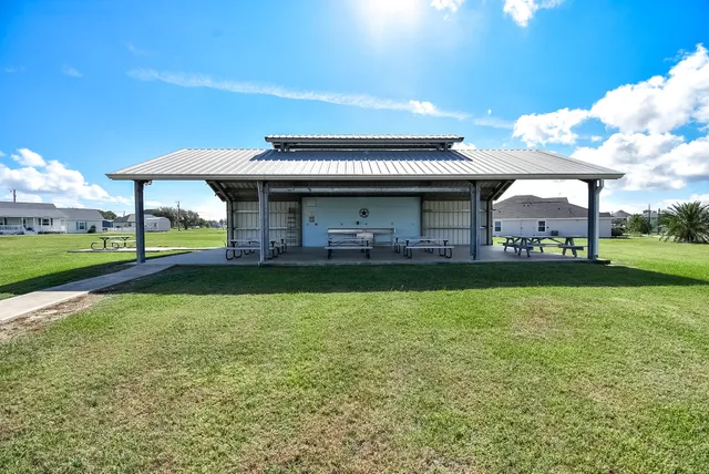 a view of a lake with a yard