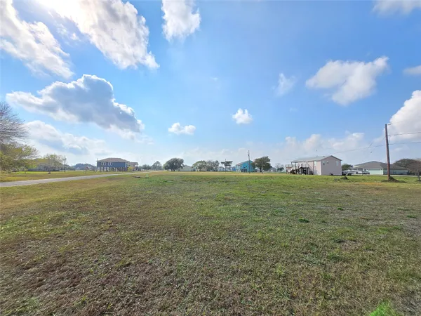 a view of a lake and sunset