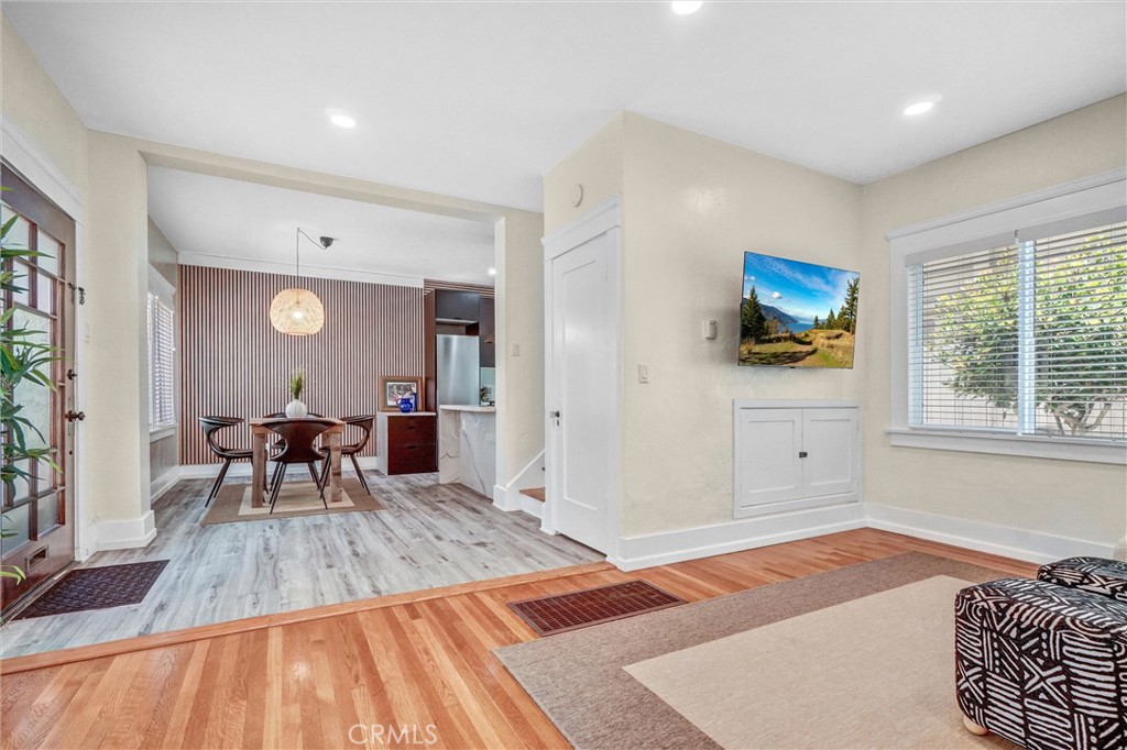 1616 East Ocean Boulevard, Unit 6 Long Beach, CA 90802 - Photo 12 of 37 a living room with furniture and a flat screen tv