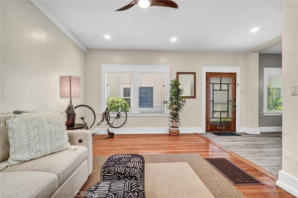 1616 East Ocean Boulevard, Unit 6 Long Beach, CA 90802 - Photo 10 of 37 a living room with furniture and a potted plant