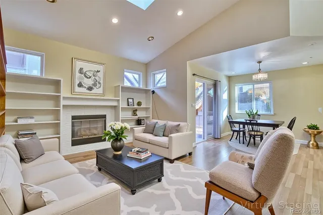 a view of a room with wooden floor and cabinet