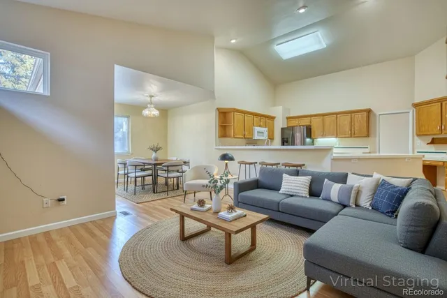 a kitchen with stainless steel appliances granite countertop a sink and a stove