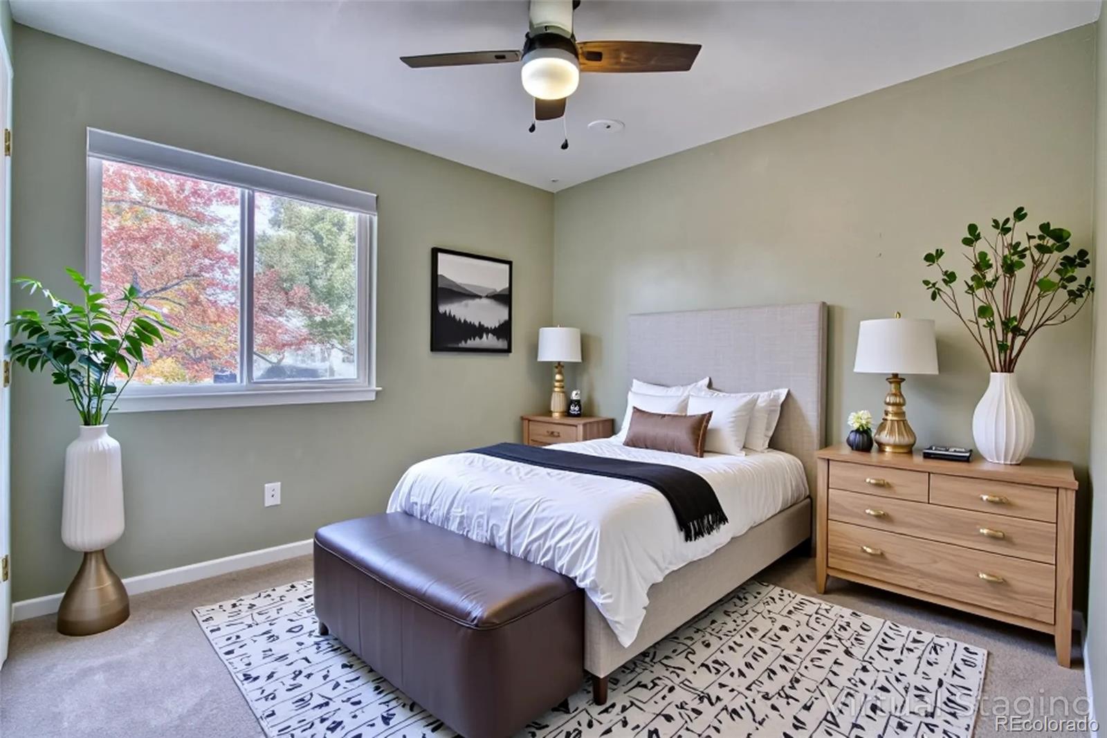 756 Brookside Drive Longmont, CO 80504 - Photo 27 of 46 a bedroom with a large bed and a window