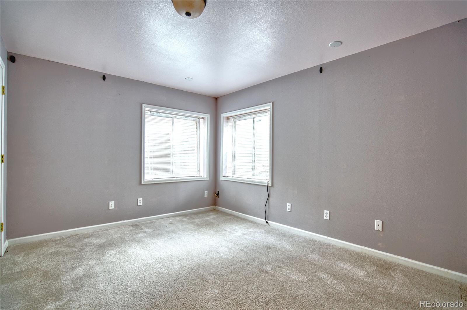 756 Brookside Drive Longmont, CO 80504 - Photo 36 of 46 a view of an empty room with a window