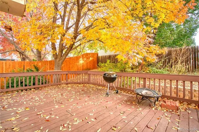 a view of a balcony with furniture