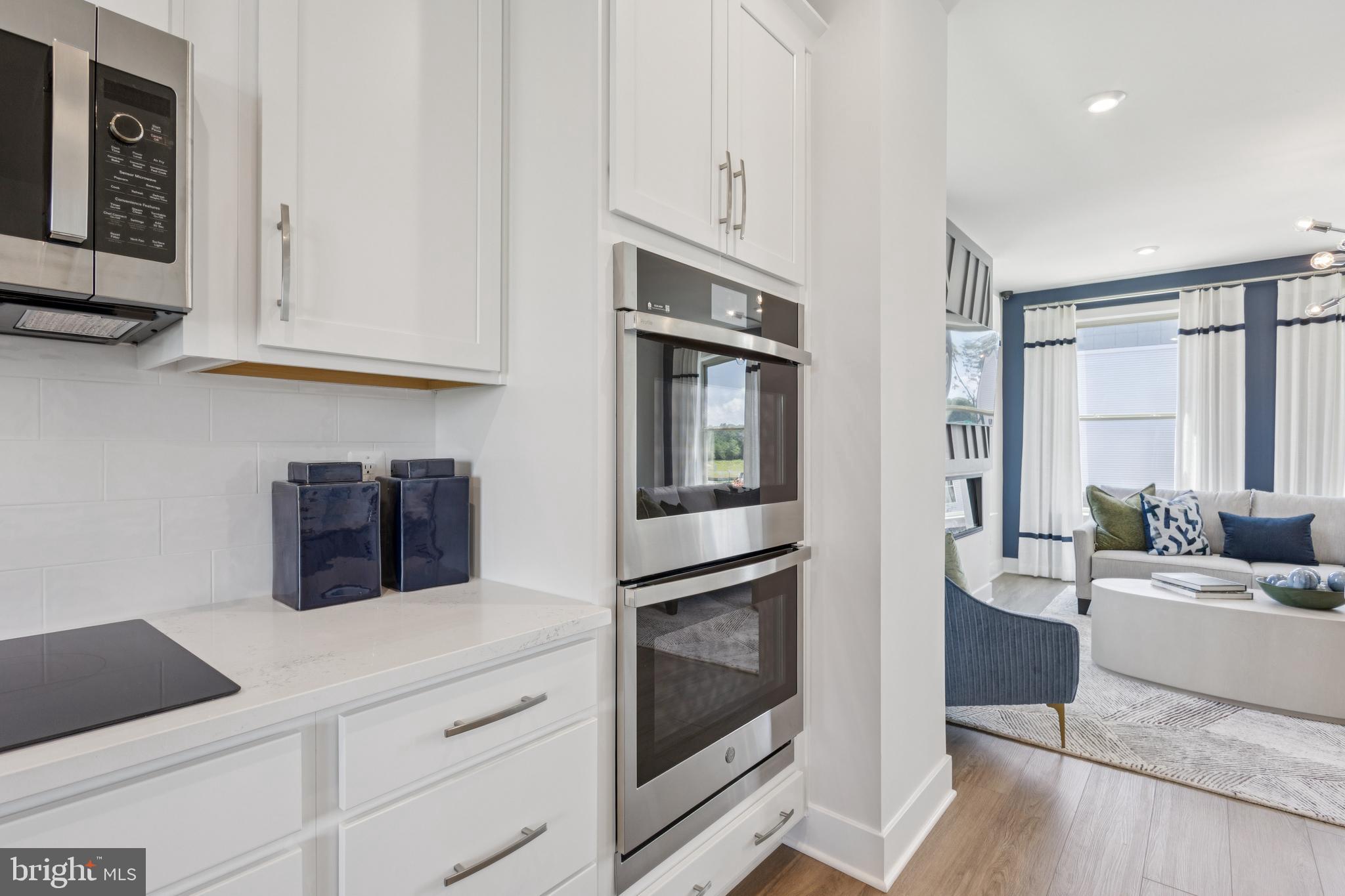 3807 Shale Ridge Road Woodbridge, VA 22193 - Photo 7 of 23 a kitchen with stainless steel appliances granite countertop a refrigerator and cabinets