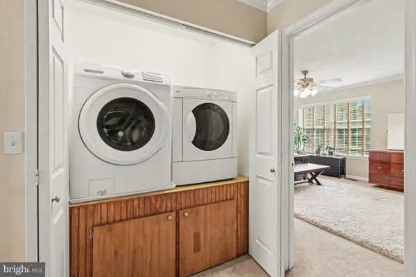 a view of living room washer and dryer