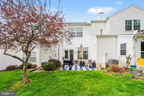 a front view of house with yard