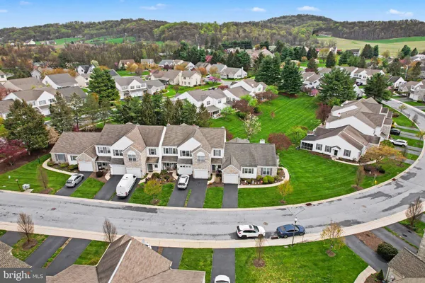 an aerial view of a house with garden