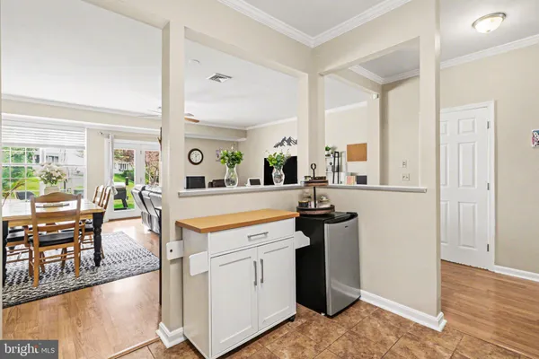 a kitchen with a stove and a refrigerator