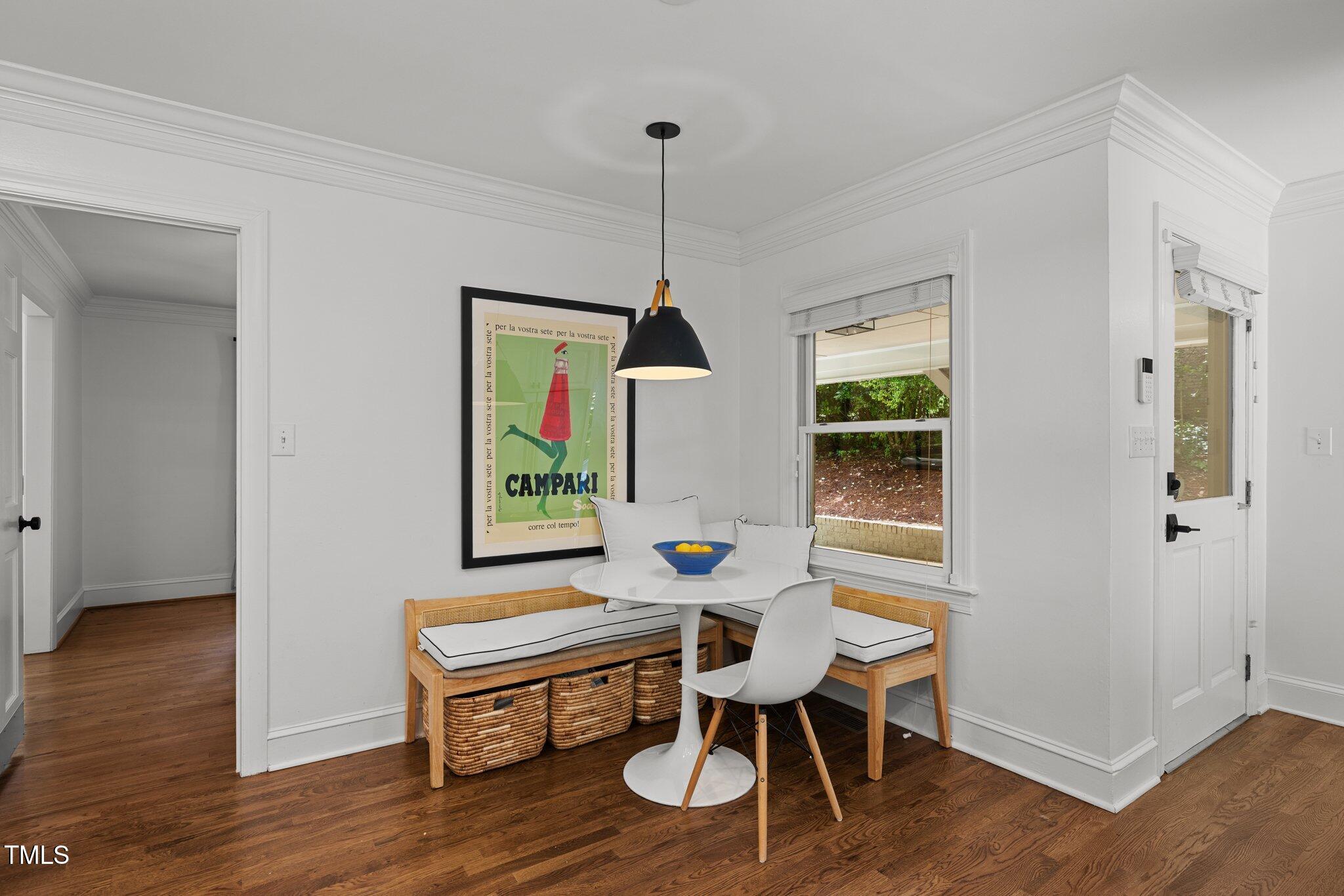 1706 Rangecrest Road Raleigh, NC 27612 - Photo 12 of 43 a living room with furniture dining table and a window