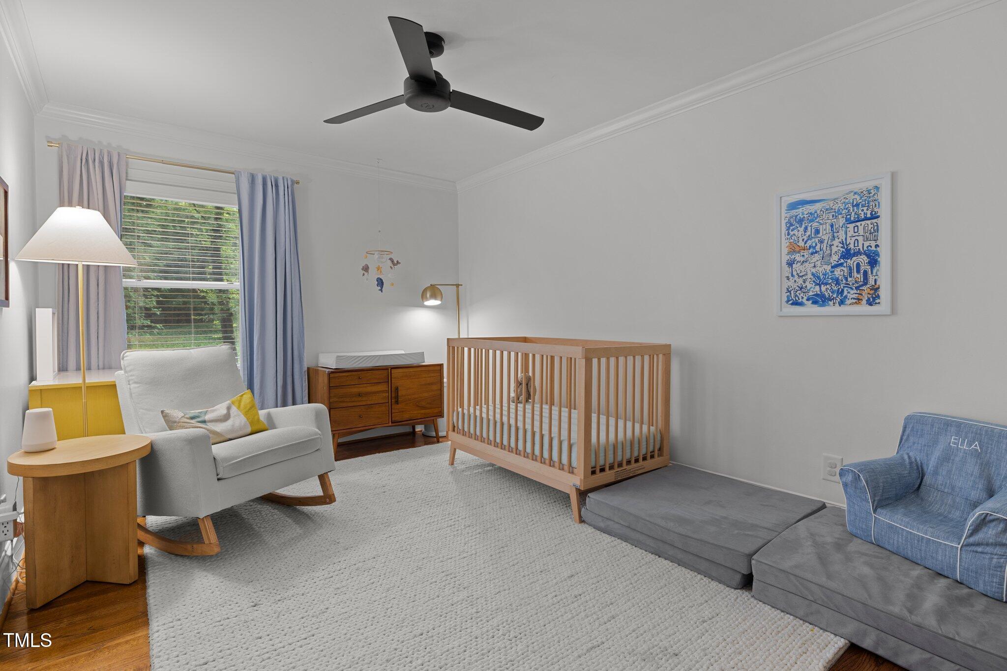 1706 Rangecrest Road Raleigh, NC 27612 - Photo 23 of 43 a living room with furniture and a window
