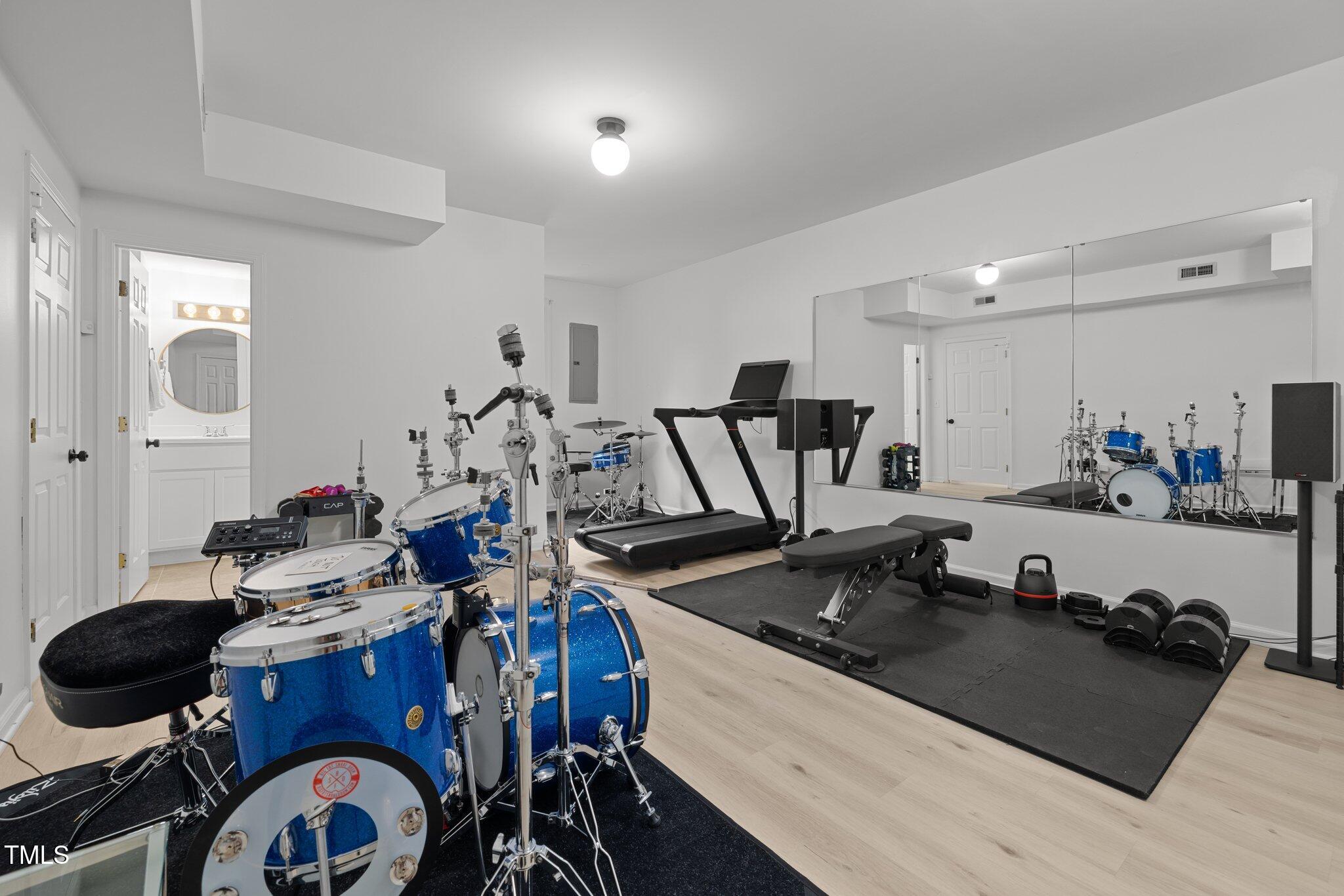 1706 Rangecrest Road Raleigh, NC 27612 - Photo 24 of 43 a kitchen with a sink stove and chairs